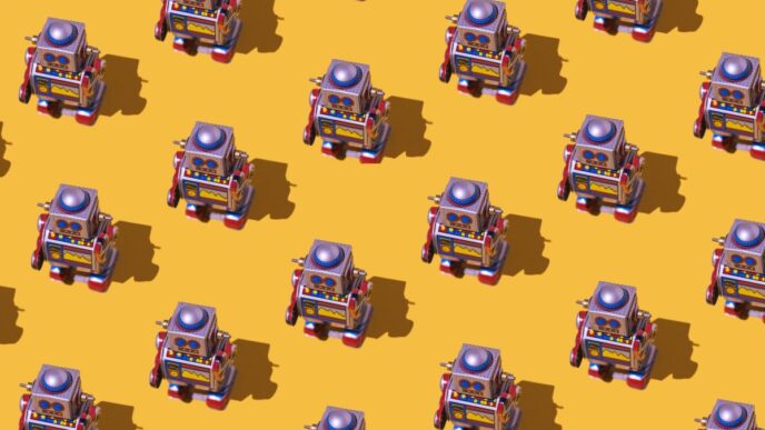 Pattern of retro tin toy robots with clocks and displays painted on yellow background.
