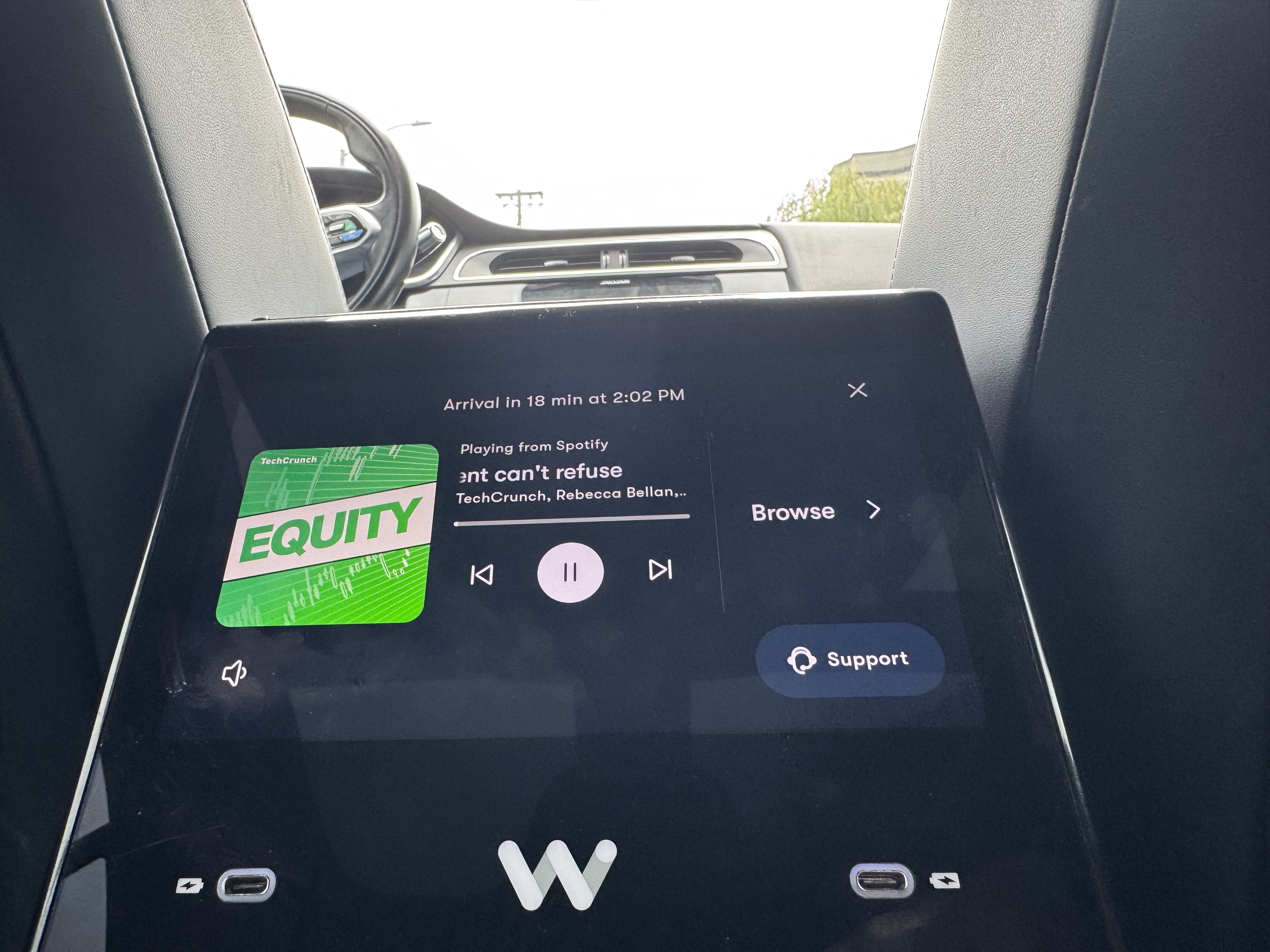Playing TechCrunch podcast on Spotify inside Waymo.
