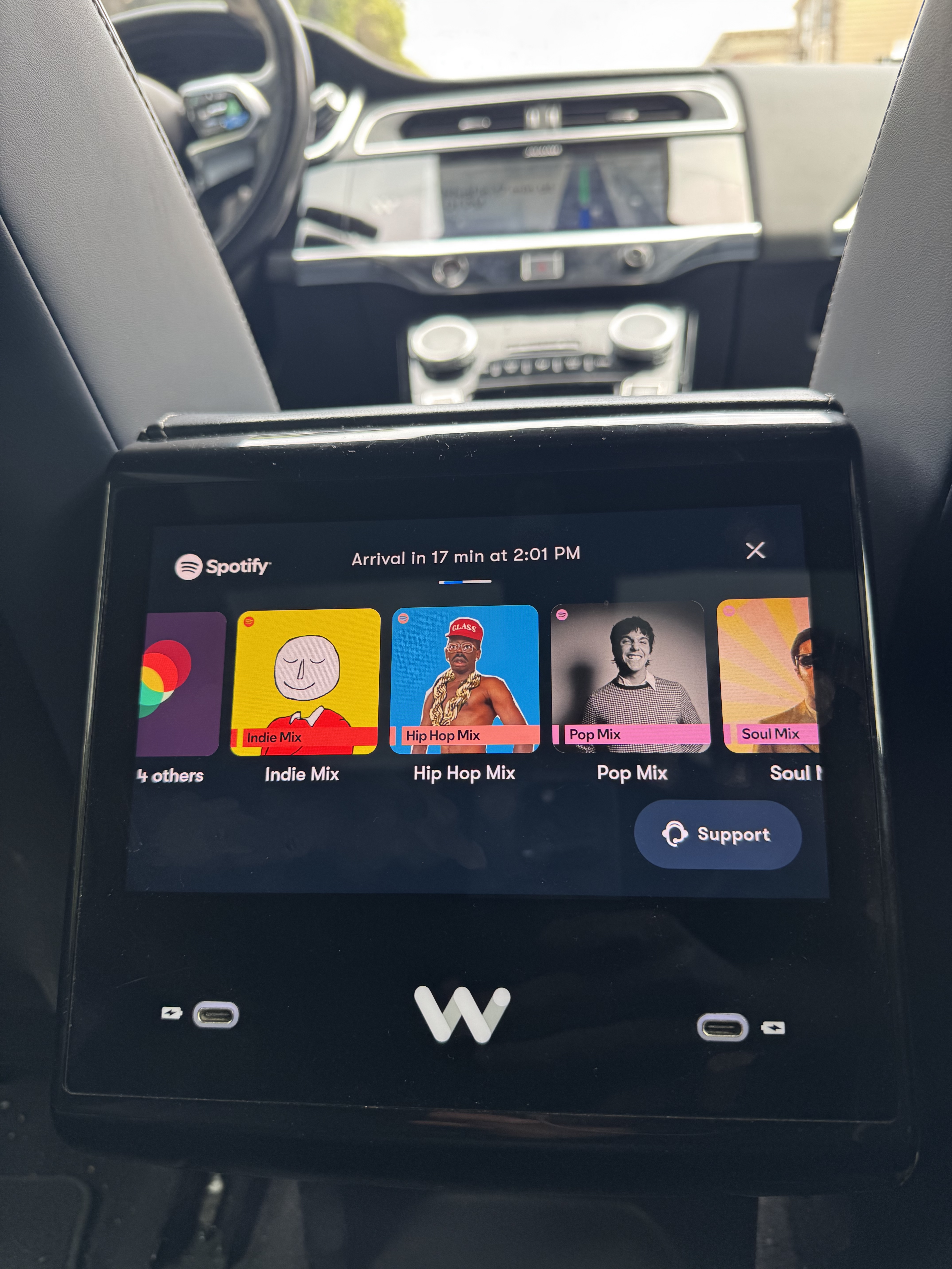 Spotify mixes on Waymo touchscreen.