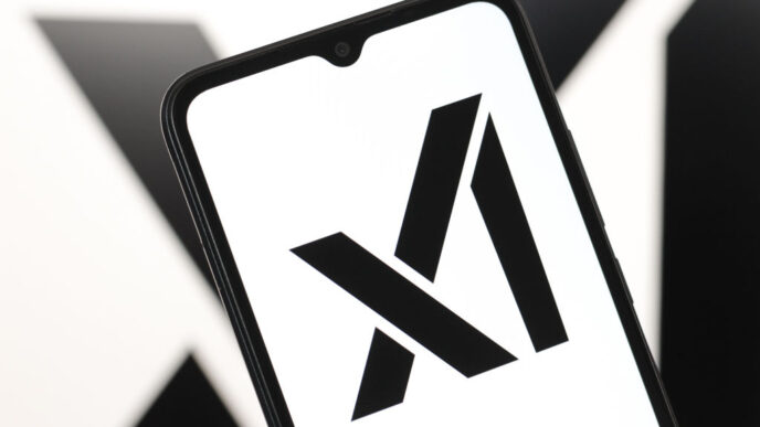 The xAI logo displayed on a smartphone screen.