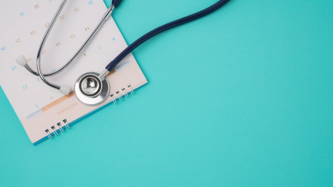 Stethoscope and a calendar. Doctor's appointment and service in the hospital.