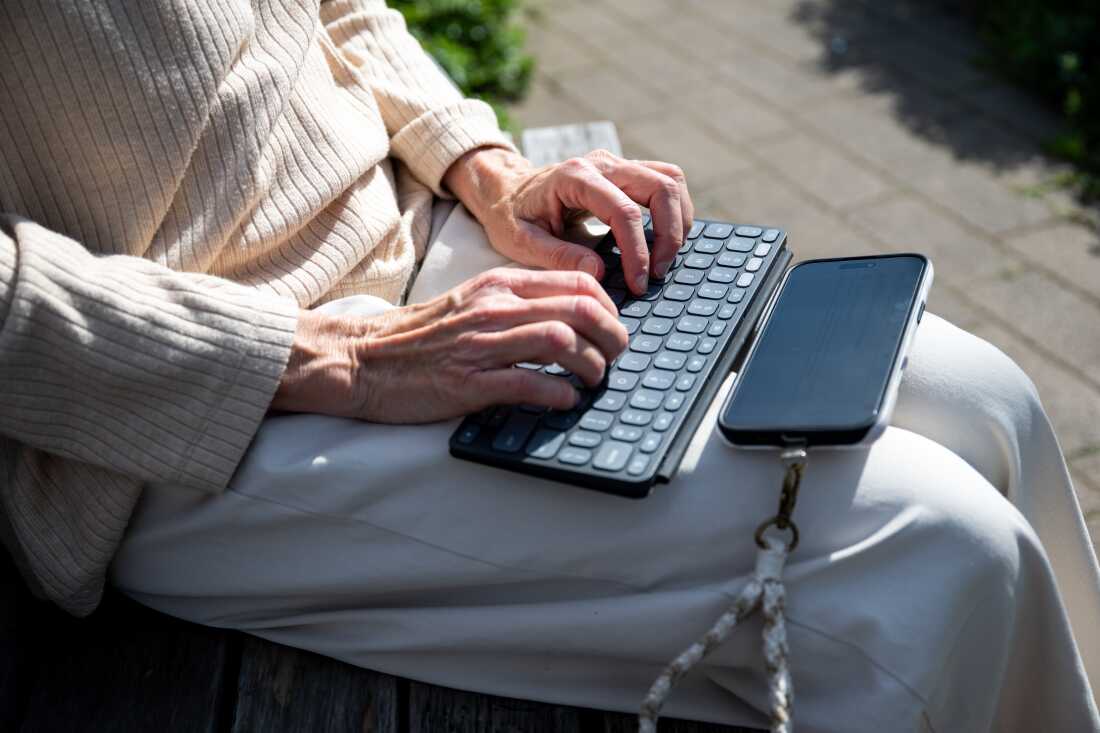 Sonya Sotinsky often uses a portable keyboard to talk using the text-to-speech software on her phone.