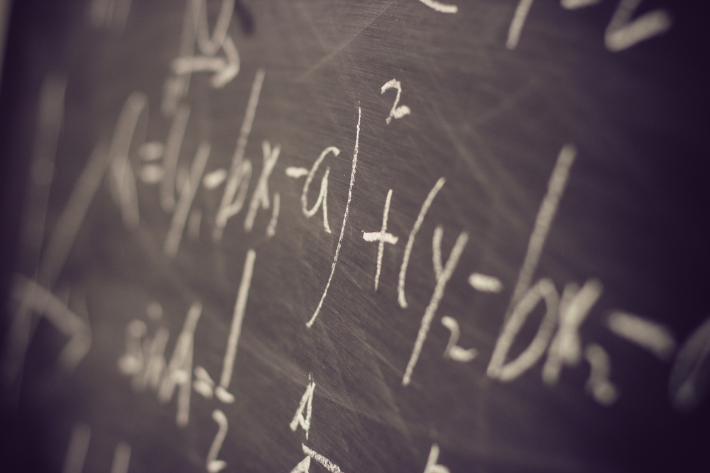 math equations on a chalkboard