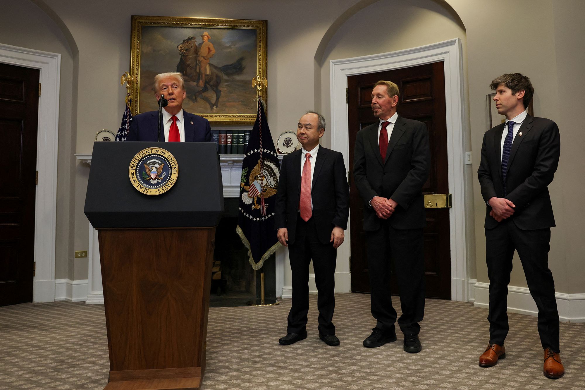 Trump delivers remarks on AI infrastructure alongside OpenAI CEO Sam Altman, SoftBank CEO Masayoshi Son, and Oracle co-founder Larry Ellison at the White House in January 2025.